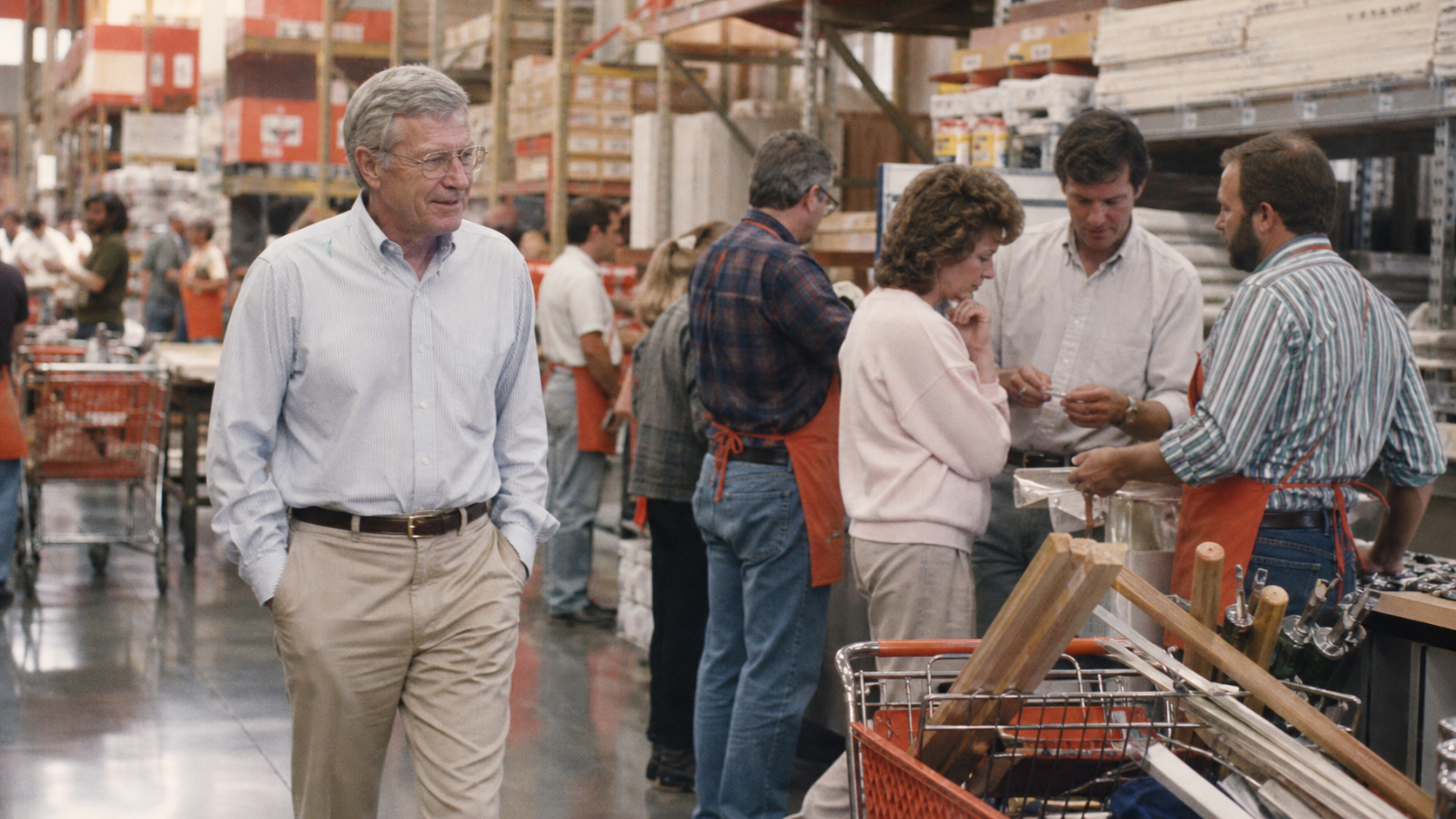 Bernard Marcus walking a Home Depot floor while frontline associates solve customer problems independently